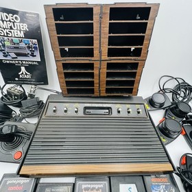 Atari 2600 Lot 43 Games 20 Manuals Console Controllers MusicMate Holder UNTESTED