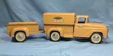 Vintage 1959 Tonka Sportsman pressed steel toy truck with camper and trailer