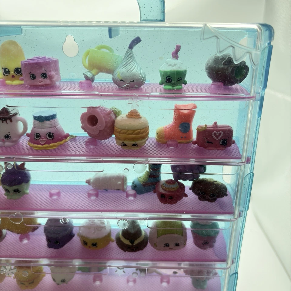 Vitrina de coleccionista Moose Shopkins azul brillo con 60+ figuras Foto 3 de 4