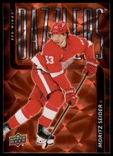 2025-26 Upper Deck #DZ-65 Moritz Seider Dazzlers Orange