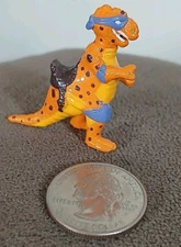 TMNT Mini Mutants Cave Bebop Dino Playset Orange Dinosaur T-Rex Trippy Cave Don