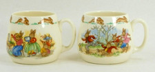 2 ROYAL DOULTON Vtg Bunnykins Child's Cups Mugs, Roller Skating Trying on Hats