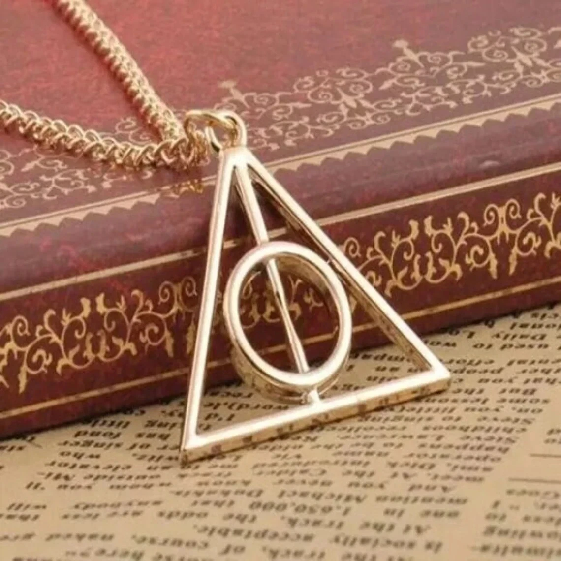 Harry potter deathly shop hallows necklace meaning