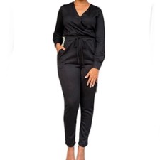 JUMPSUIT. Long sleeve. Black. V-neck. Tie waist. NWOT