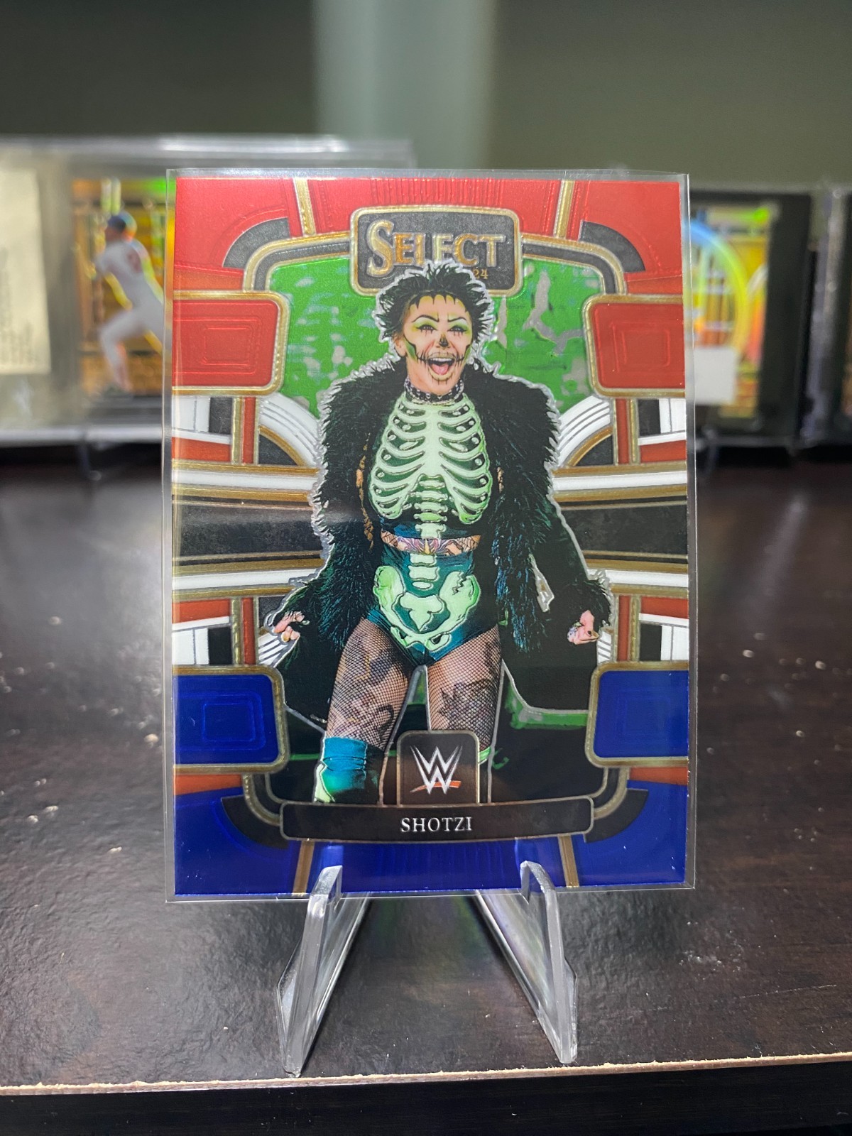 2024 Panini Select WWE - Concourse Shotzi Blackheart #96 Red & Blue Parallel