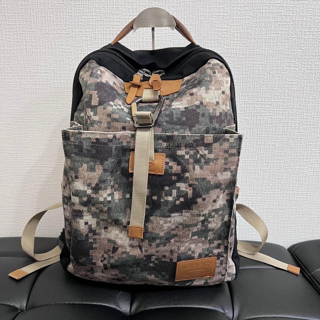 Collaboration camouflage roll backpack master-pie… - image 2