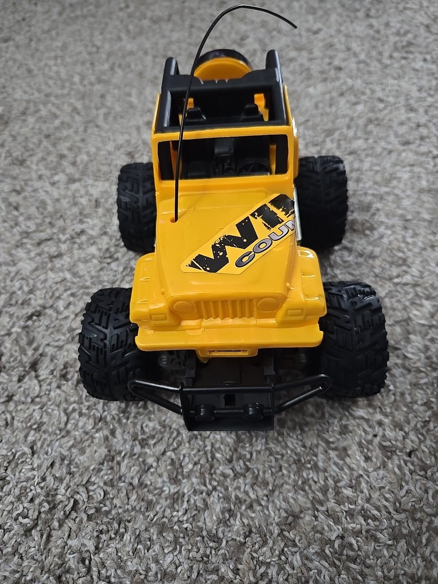 New Bright RC Jeep Yellow Wrangler Wild Country Remote Control Car