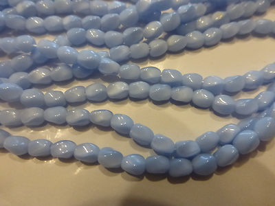 Lot De 600 Perles Anciennes En Verre Bleu Pastel, Forme Torsadée, 5.5 X 4 Mm - Fond De Stock