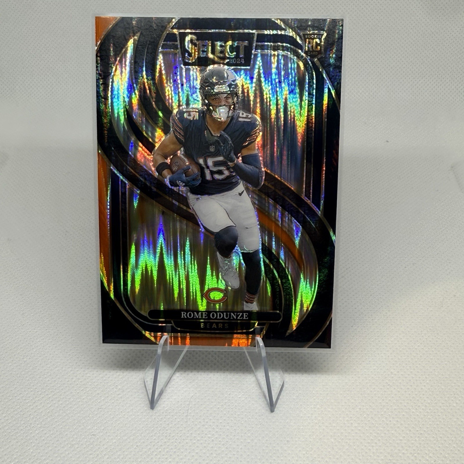 2024 Panini Select Premier Level Rome Odunze #136 Black Orange Shock Prizm (RC)
