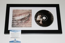 ALANIS MORISSETTE SIGNED FRAMED SUPPOSED FORMER INFATUATION JUNKIE CD BECKETT