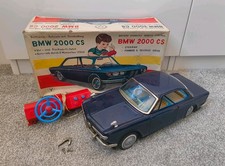 Vintage Yonezawa BMW 2000 CS battery operated Tin Car Toy.Japan 1960's.repairs