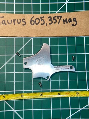 Taurus 605, 357 mag ,Side plate , and three Factory screws