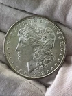 1902-O Morgan Silver Dollar With Capsule. Brilliant AU Quality!