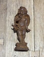 RUSTY CAST IRON CHERUB