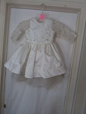 white sequined girls' party dress with a satin skirt. Size 120/3