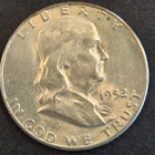 1952s Franklin silver half dollar.Au/low mint