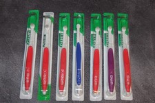 Lot of 7 GUM End Tuft Toothbrushes 308, New in packages.Made in the USA