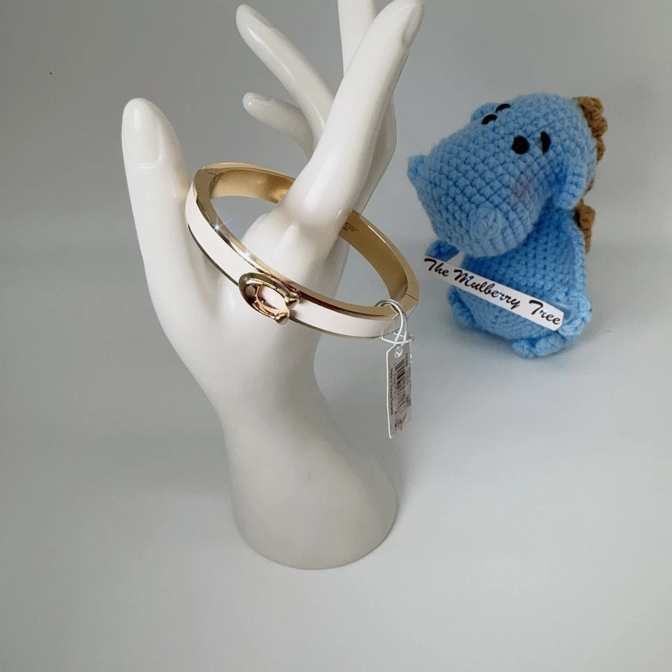 LIQUIDACIÓN Brazalete Coach F67480 Signature Bisagras Empuje Dorado/Tiza Nuevo con Etiquetas Foto 2 de 4