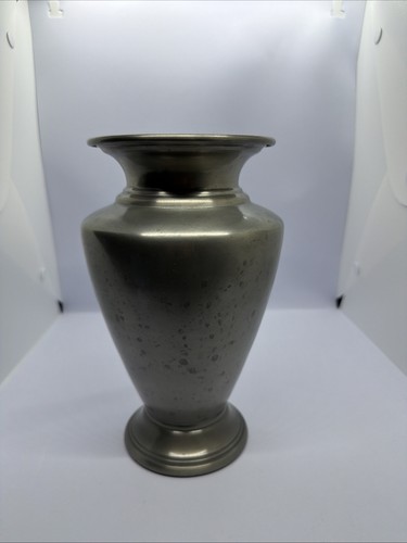 Restoration Hardware vase made of pewter with a silver color