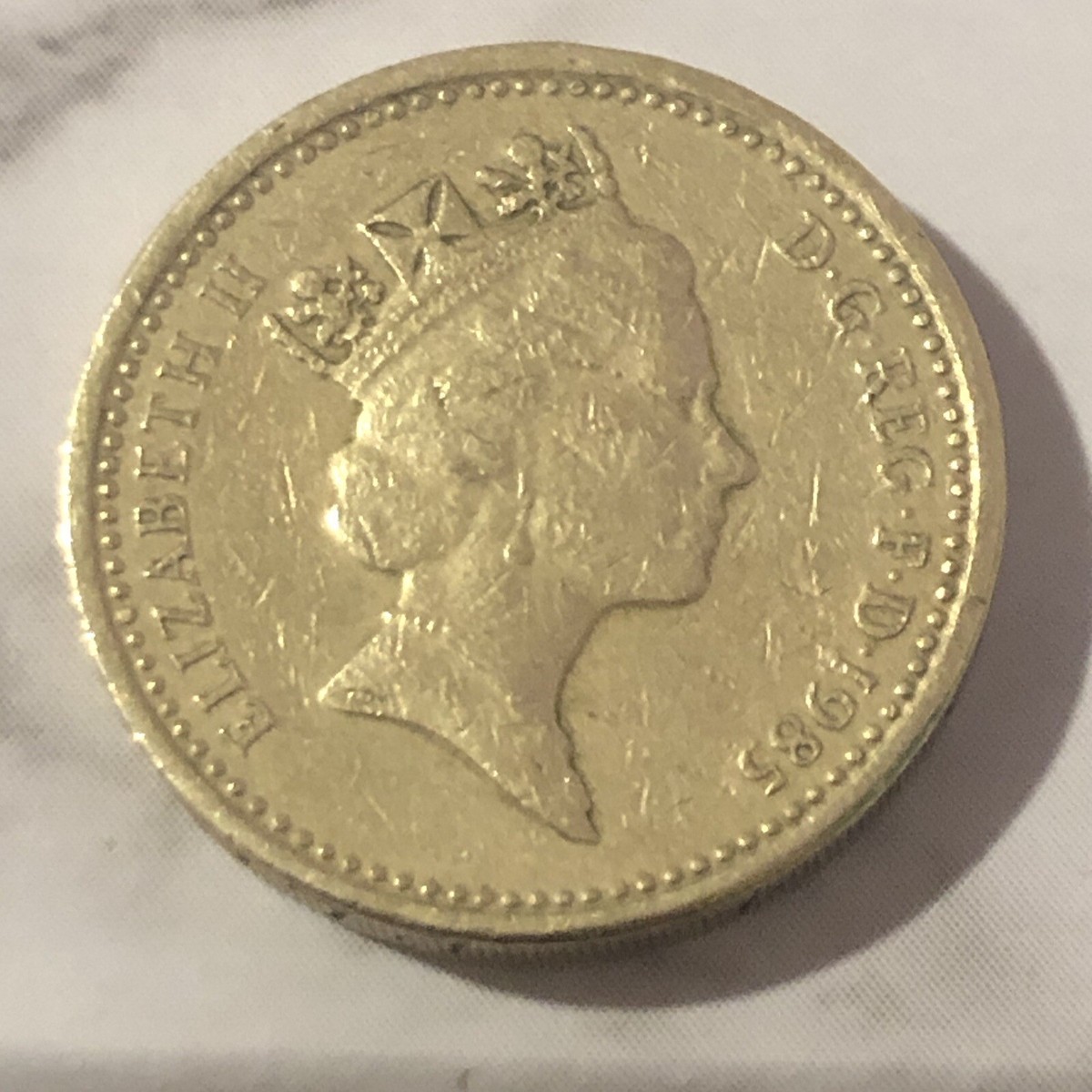 1985 ONE POUND ELIZABETH II (RARE) COIN UPSIDE DOWN EDGE
