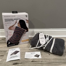 Calming Heat Massaging Weighted Heating Pad by Sharper Image open box