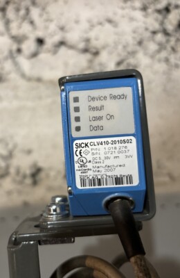 SICK CLV410-2010S02 / CLV4102010S02 fixed bar code reader,  backet included