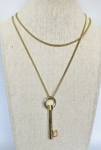 VETEMENTS Collana Victoria Secret lunga 40 pollici tono oro con ciondolo chiave