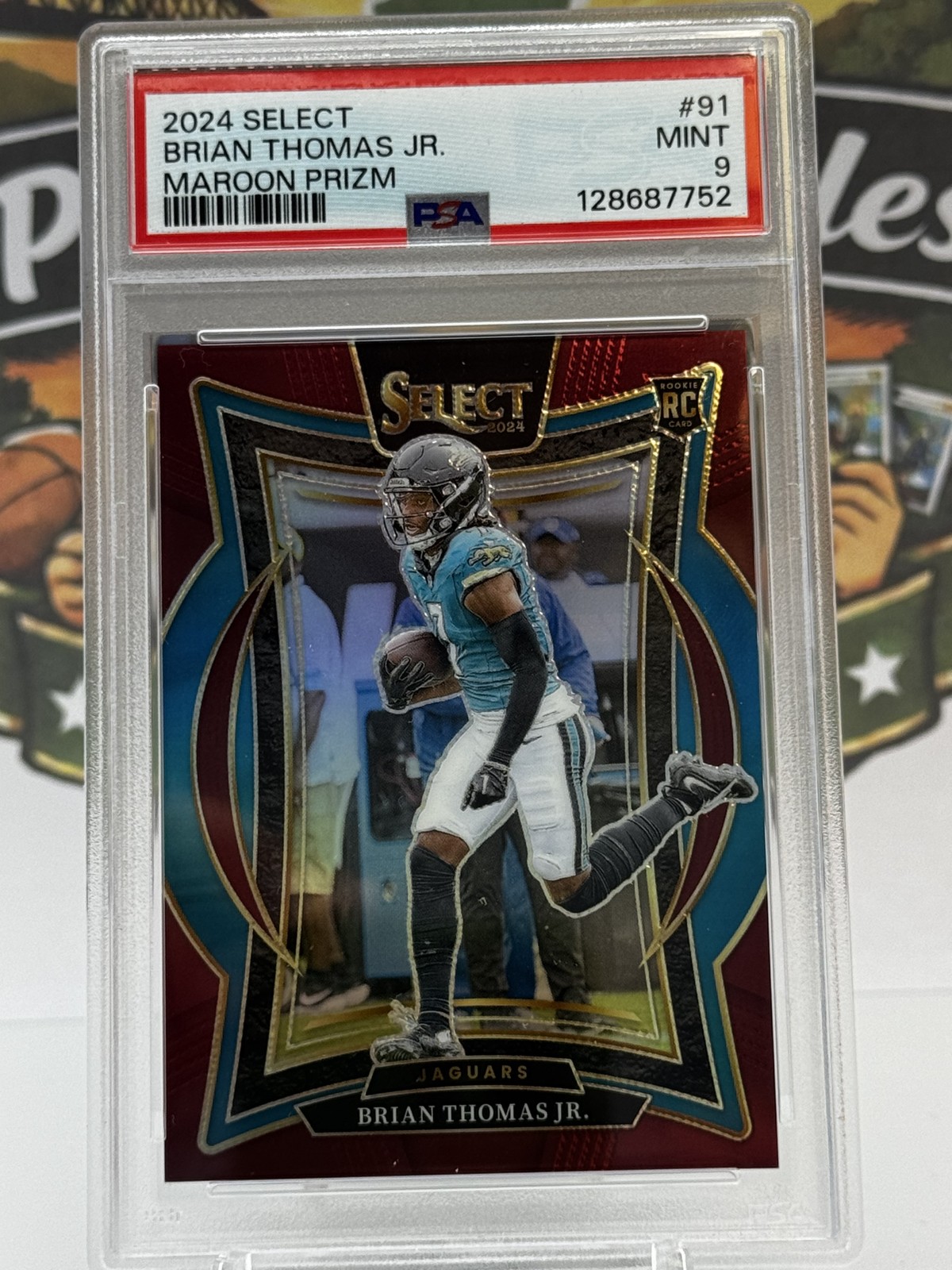 2024 Panini Select - Concourse Brian Thomas Jr. #91 Maroon Prizm 25/149 (RC)