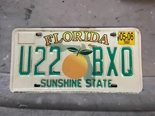 FLORIDA LICENSE PLATE U22 BXQ MAY 2006 SUNSHINE STATE SINGLE ORANGE