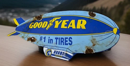 VINTAGE 12” X 5.5” GOODYEAR TIRES PORCELAIN  SALES SERVICE AVIATION BLIMP SIGN