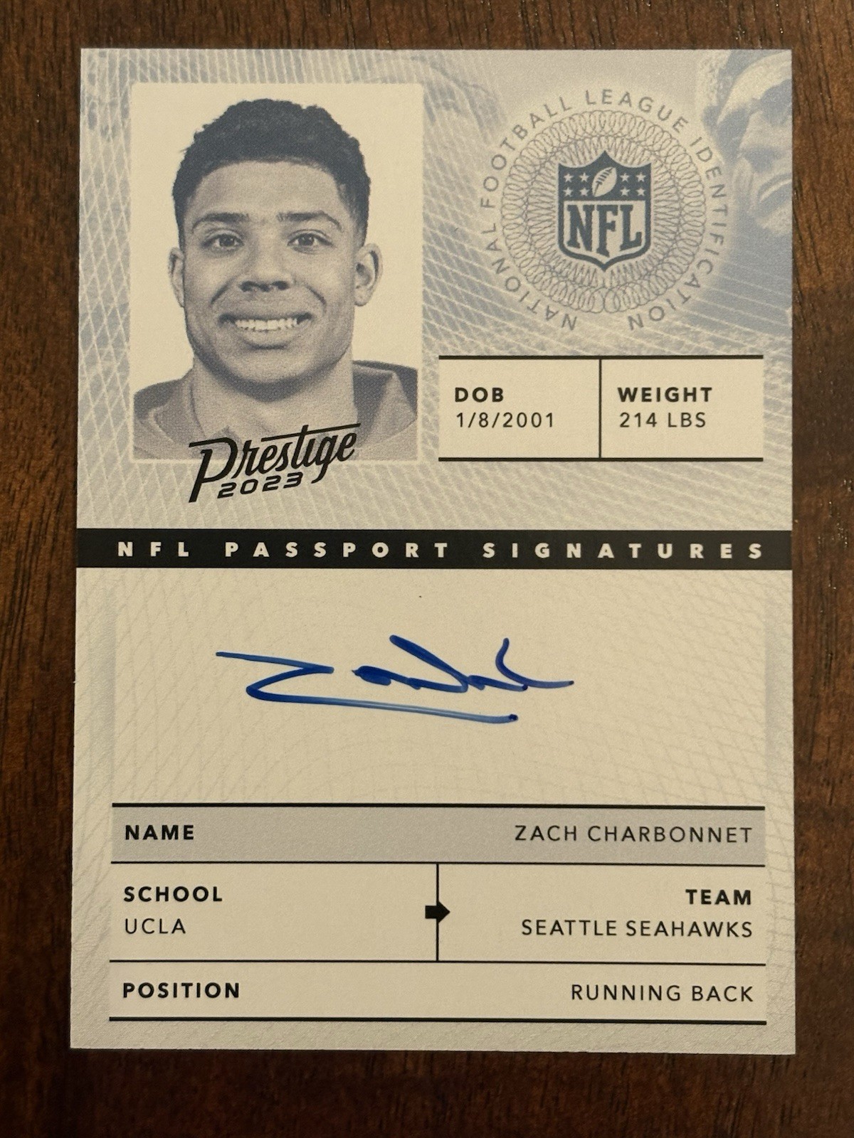 2023 Panini Prestige Zach Charbonnet NFL Passport Signatures RC Auto #NPS-ZC