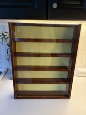 Vintage wooden display case featuring a glass front and four shelves