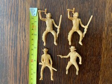 Vintage cowboys Indians, tan color, set of 4, circa 1950s, probable L Marx Co
