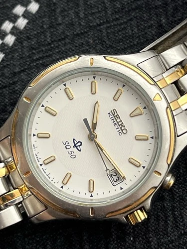 Seiko Kinetic SQ50 Mens Silver Gold Vintage Watch Date Stainless Steel 5M42-0C70