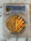 1987 Monster Flame Toned PCGS MS 66 American Silver Eagle 1 oz Silver N/R