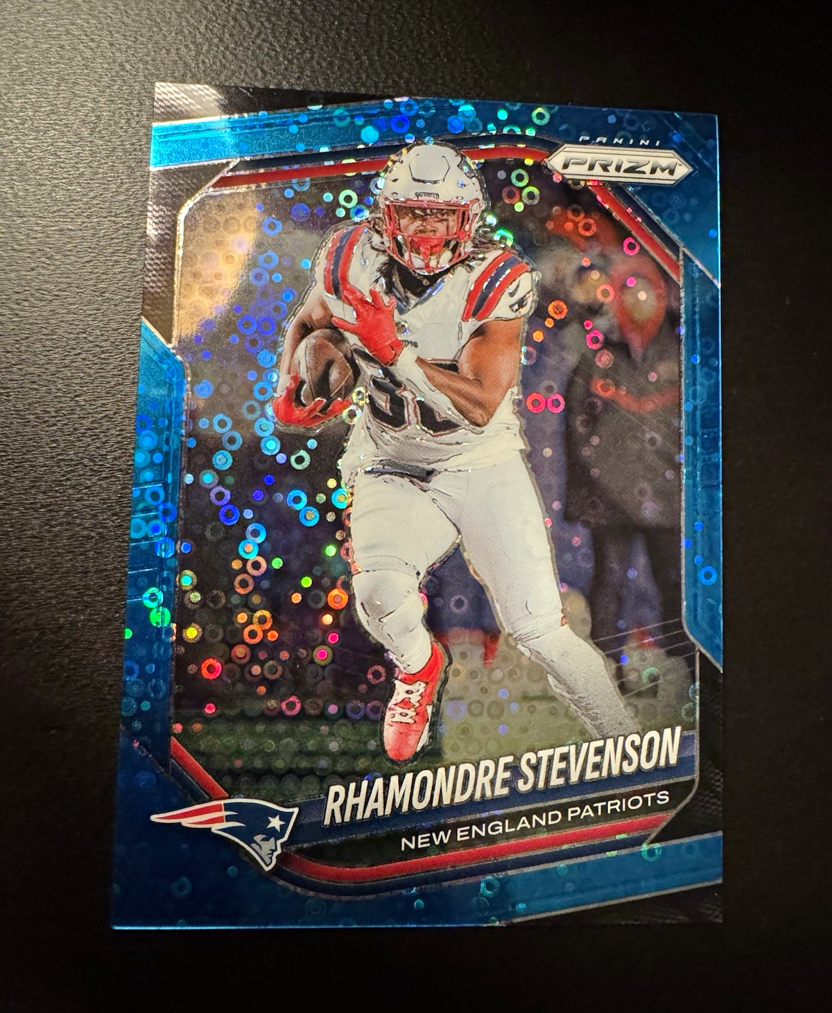 2025 Panini Prizm Rhamondre Stevenson No Huddle Blue Prizm #84/125 Patriots