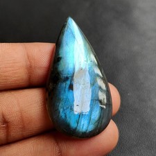 Pierre précieuse cabochon en forme de poire cabochon bleu naturel flash 68 ct...