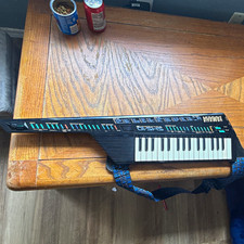 Yamaha SHS-10 MIDI Keytar 32-Key Electronic Keyboard,Black w/ Strap