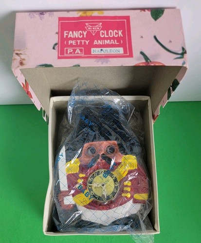 Rare Napoleon Mi-Ken Moving Eyes Wind Up Clock With Key & Pendulum.