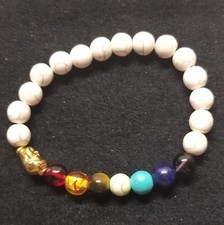 PULSERA CUENTAS ROCA LAVA Y CUENTAS PIEDRAS PRECIOSAS DE 7 CHAKRAS CON CABEZA DE BUDA TONO DORADO