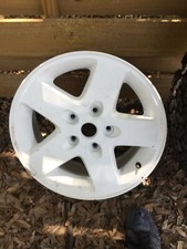 2016 Jeep Wrangler 5-spoke White Rims And 32 Inch Baja Champion Tires