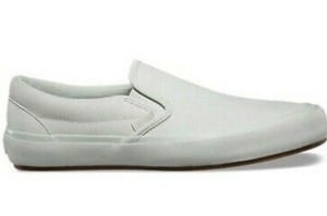 ivory slip on vans