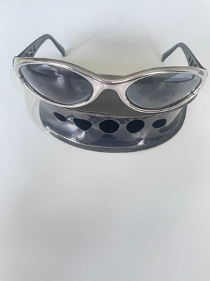 Vintage Diesel Y2K-style sunglasses, silver, oval shape. Free shipping.