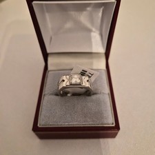 Moissanite ring in platinum over  Sterling silver