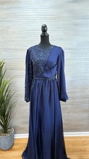 Navy Blue Formal Gown with Embellished Bodice and Elegant Long Sleeves