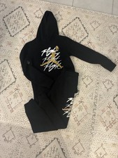 Youth Large Jordan sweatsuit black gold and white