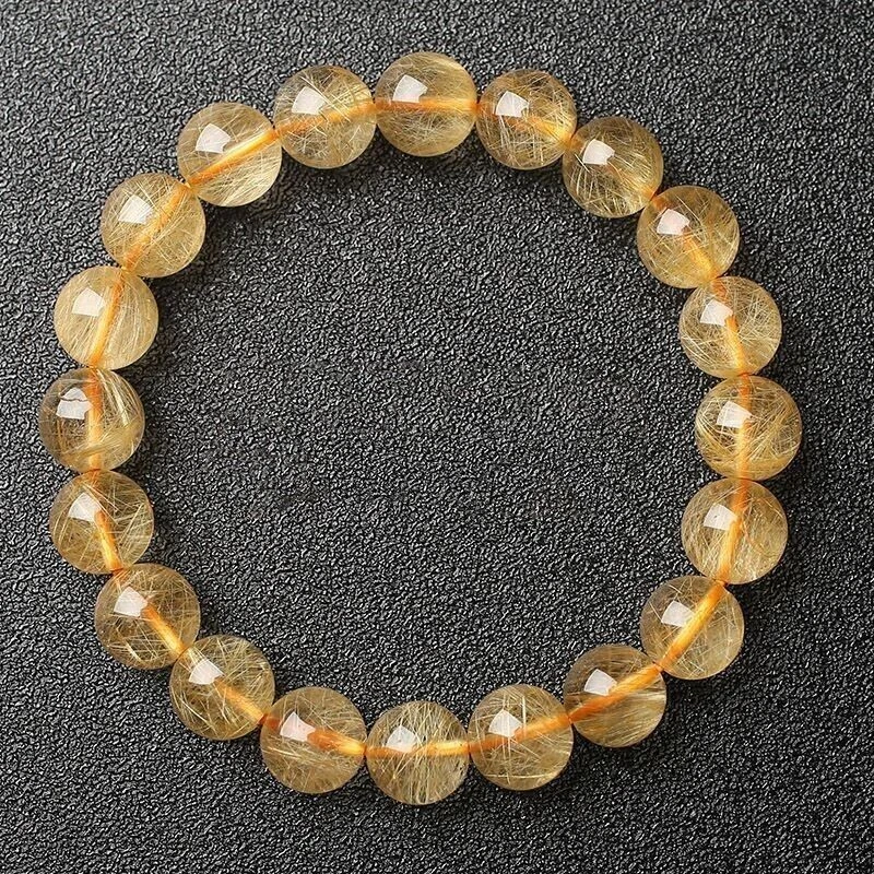 Brazalete de cuentas de cristal natural oro titanio rutilado AAA 10-9 mm traer riqueza Foto 3 de 3