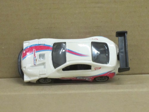 Toyota Celica Pikes Peak in bianco ""Sweet Tarts"", senza IMBALLO ORIGINALE, Hot Wheels, circa 1:64 - Foto 3 di 3