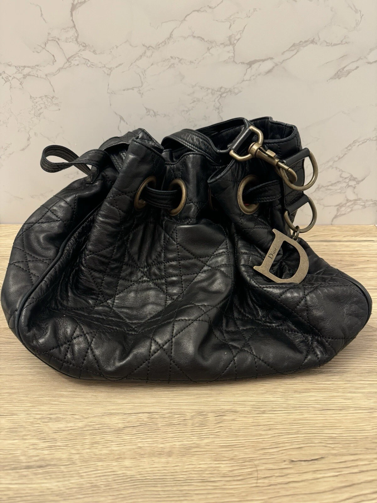 Sac à bandoulière vintage CHRISTIAN DIOR cannage cordon seau noir 194 BM 0027
