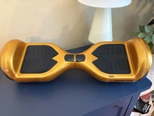 SWAGTRON Hoverboard box, manual and charger Gold
